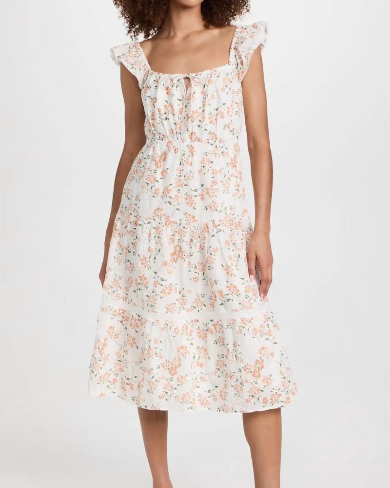 Front of a model wearing a size L Acropolis Hills Midi Dress in Orange Floral in Orange Floral by LOST + WANDER. | dia_product_style_image_id:339372